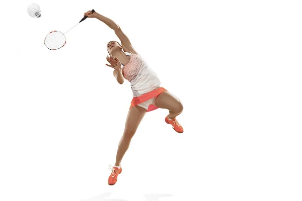 Young woman playing badminton over white background — Stock Photo, Image