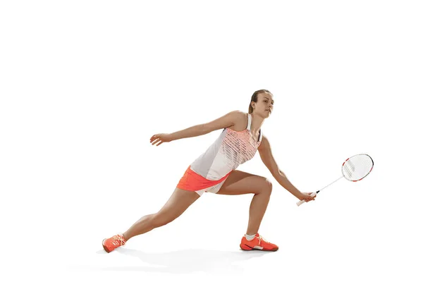 Young woman playing badminton over white background — Stock Photo, Image