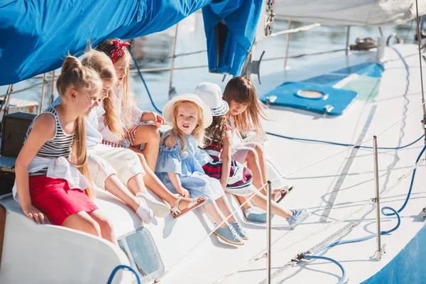 The children on board of sea yacht — Stock Photo, Image