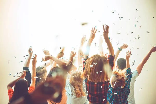 Nightlife and disco concept. Young people are dancing in club. — Stock Photo, Image