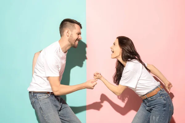 A couple of young man and woman dancing hip-hop at studio. — Stock Photo, Image