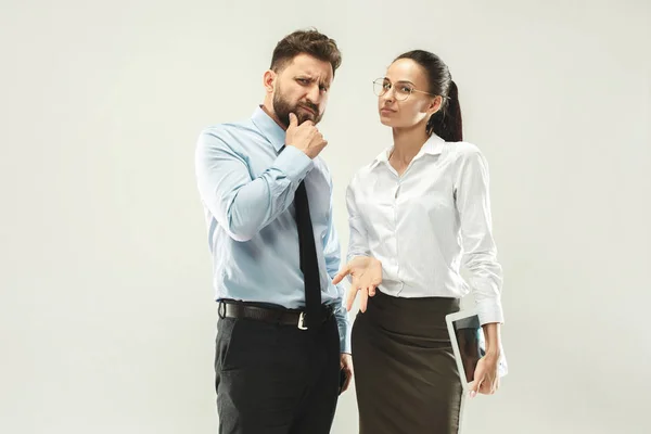 Angry boss. Man and his secretary standing at office or studio — Stock Photo, Image