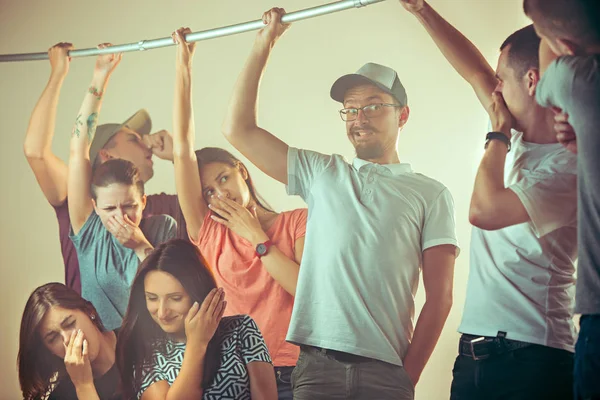 Sweaty armpits. Sweaty man. Bus. Public transport. The unhappy people near man — Stock Photo, Image