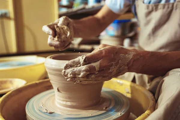 Creating a jar or vase of white clay close-up. Master crock. Man hands making clay jug macro. — Stock Photo, Image