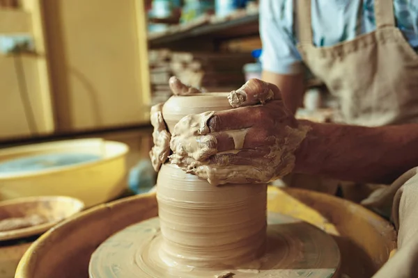 Creating a jar or vase of white clay close-up. Master crock. Man hands making clay jug macro. — Stock Photo, Image