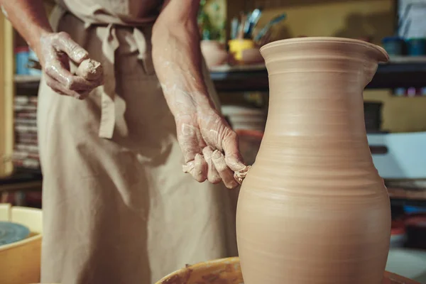 Creating a jar or vase of white clay close-up. Master crock. Man hands making clay jug macro. — Stock Photo, Image