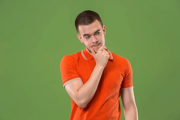 Suspiciont. Doubtful pensive man with thoughtful expression making choice — Stock Photo, Image