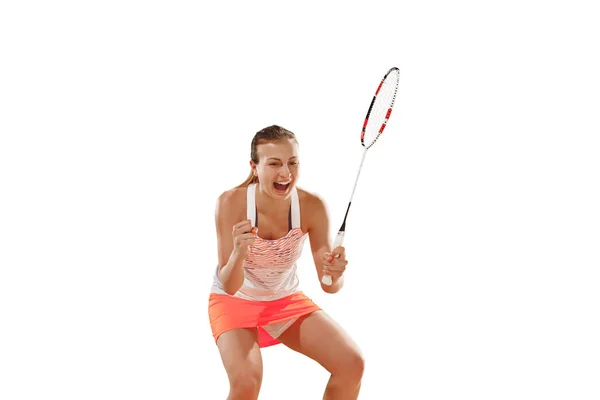 Jonge vrouw spelen badminton op witte achtergrond — Stockfoto