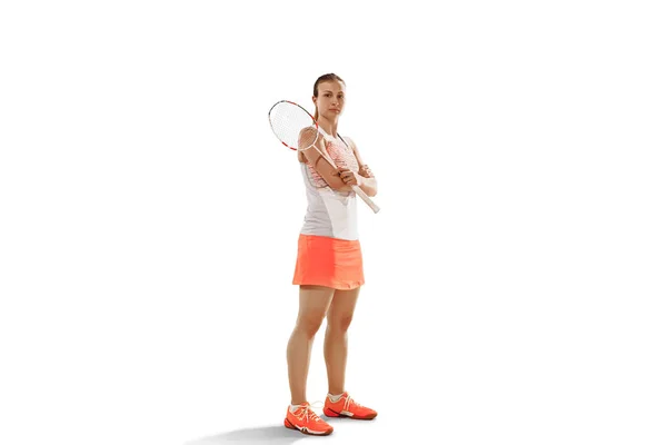 Young woman badminton player standing over white background — Stock Photo, Image