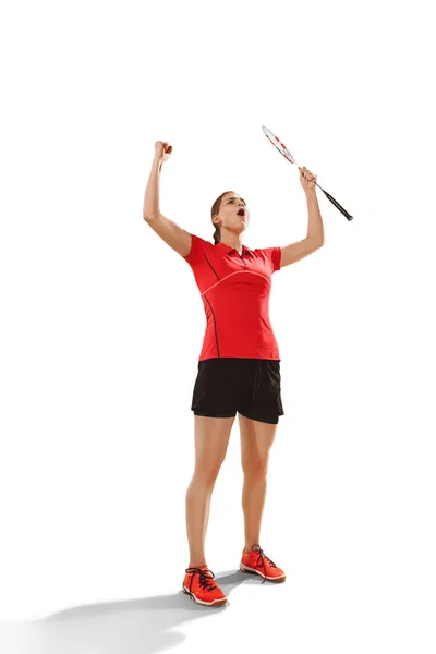 Jovem mulher badminton jogador como vencedor posando sobre fundo branco — Fotografia de Stock