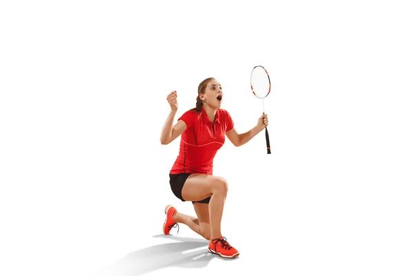 Giovane donna badminton giocatore come vincitore posa su sfondo bianco — Foto Stock