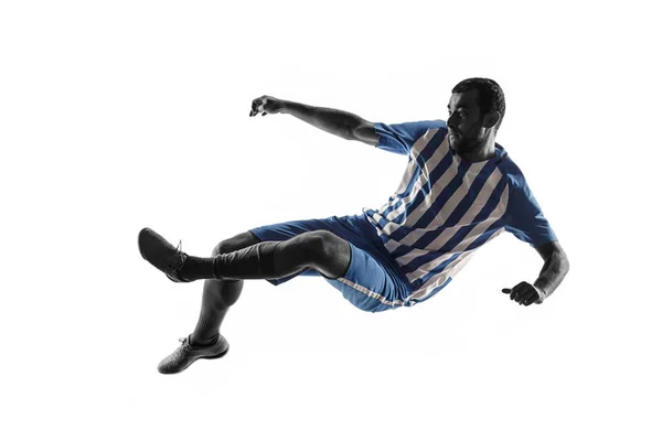 Soccer voetballer in actie geïsoleerd op witte achtergrond — Stockfoto
