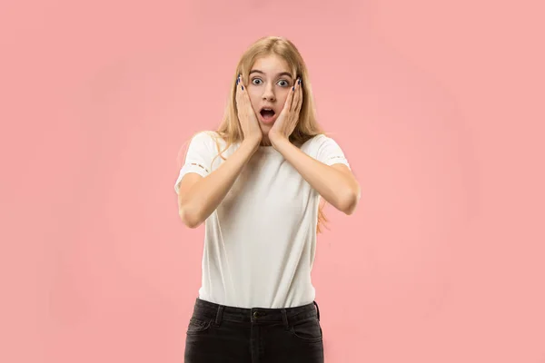 Beautiful woman looking suprised isolated on pink — Stock Photo, Image