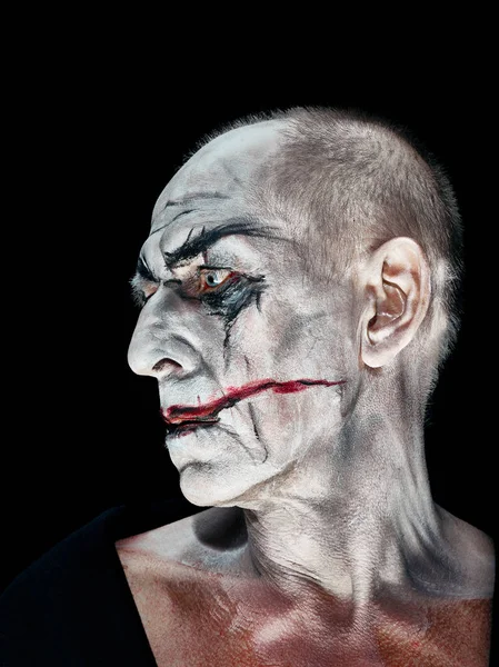 Кровавый Хэллоуин тема: сумасшедший маньяк лицо — стоковое фото