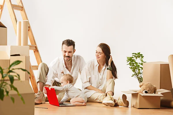 Couple moving to a new home - Happy married people buy a new apartment to start new life together Stock Picture