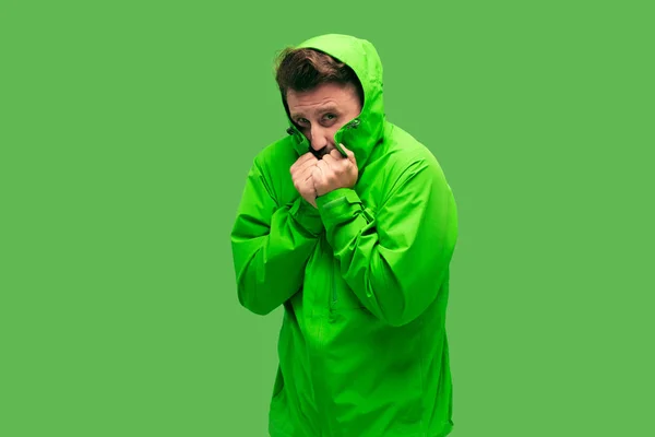 Handsome bearded young man isolated on green — Stock Photo, Image