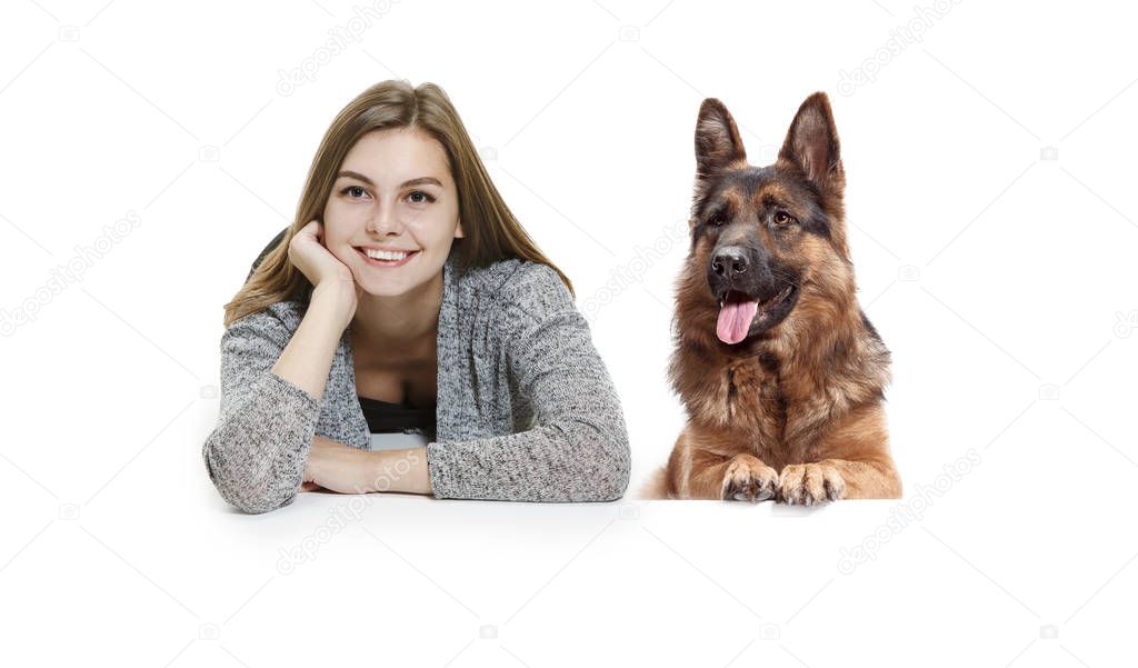 Woman with her dog over white background