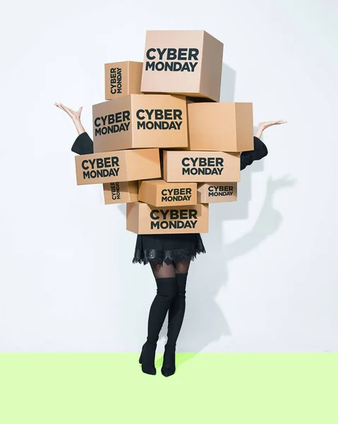 Gift boxes in the hands of young woman — Stock Photo, Image