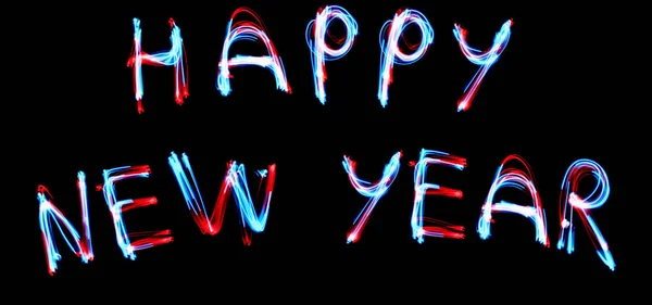 Conceptul de CELEBRATIE ANUL NOU. 2019 HAPPY NEW YEAR text fluorescent tub Neon Semnați pe peretele de cărămidă întunecată . — Fotografie, imagine de stoc