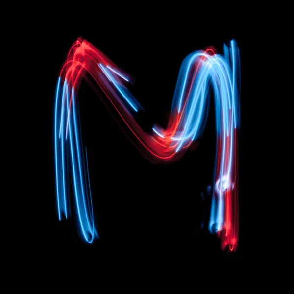 Lettera M dell'alfabeto composto da segni al neon — Foto Stock