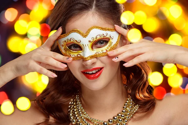 Beauty model woman wearing venetian masquerade carnival mask at party — Stock Photo, Image