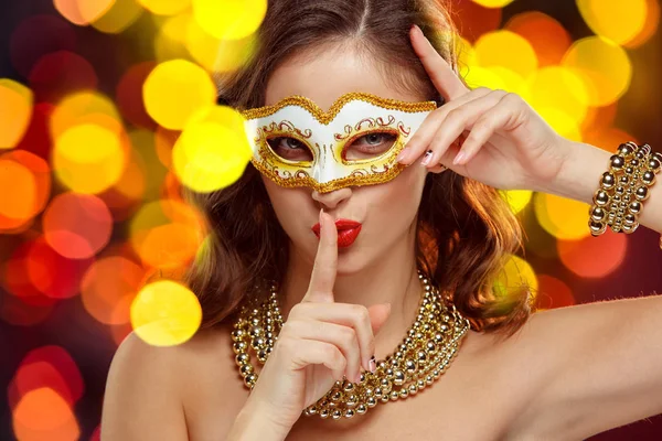 Beauty model woman wearing venetian masquerade carnival mask at party — Stock Photo, Image