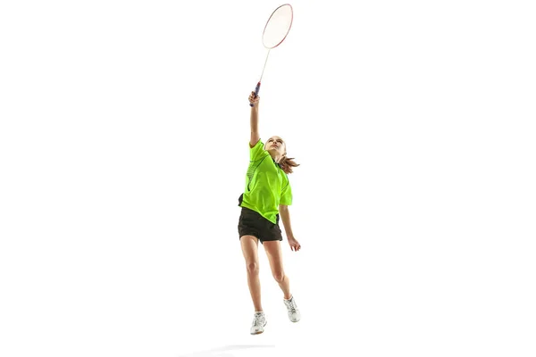 Um caucasiano jovem adolescente mulher jogando Badminton jogador isolado no fundo branco — Fotografia de Stock