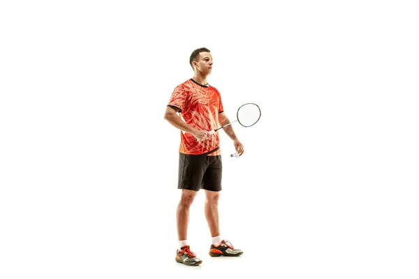 Young male badminton player over white background — Stock Photo, Image