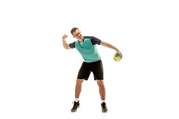 The one caucasian young man as handball player at studio on white background — Stock Photo, Image