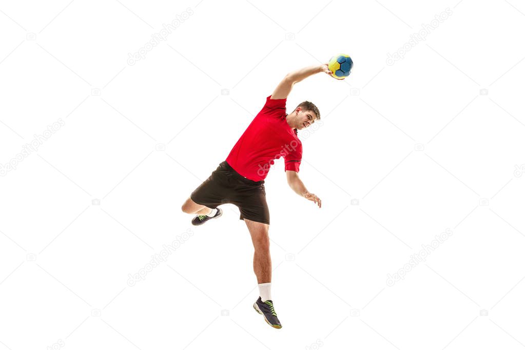 The one caucasian young man as handball player at studio on white background