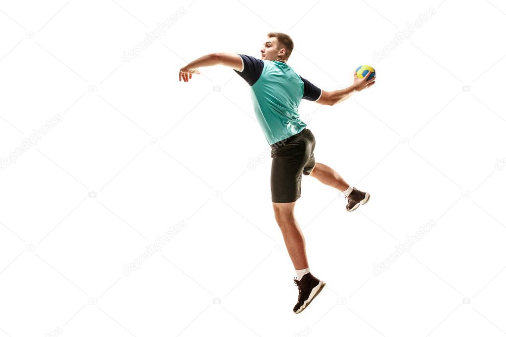 The one caucasian young man as handball player at studio on white background