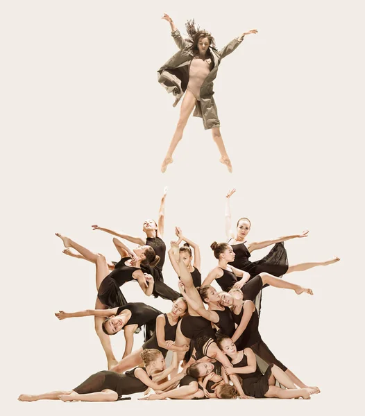 The Group Of Modern Ballet Dancers Dancing On Gray Studio Background Stock  Photo, Picture and Royalty Free Image. Image 112164923.