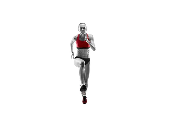 Una mujer caucásica corriendo sobre fondo blanco —  Fotos de Stock