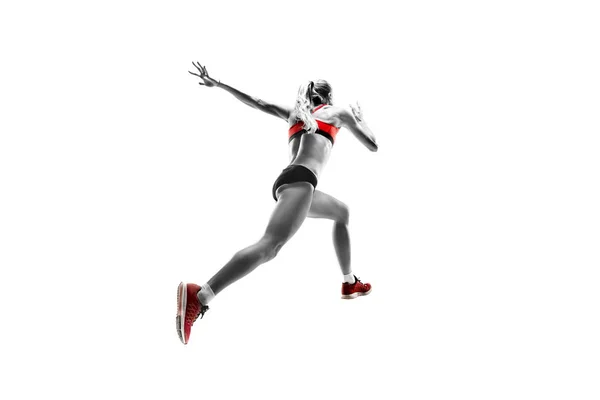 Una mujer caucásica corriendo sobre fondo blanco —  Fotos de Stock