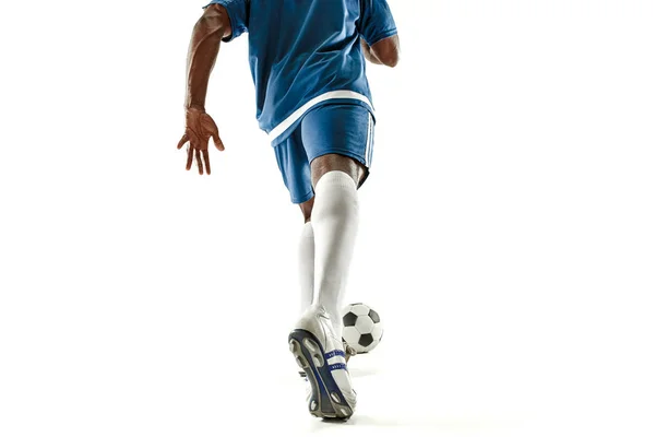 Pernas de jogador de futebol close-up isolado em branco — Fotografia de Stock