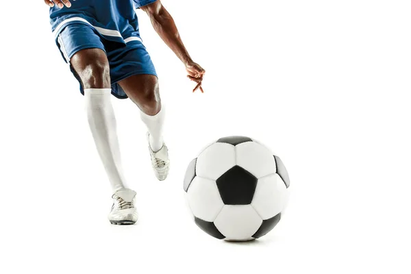 Benen i fotboll spelare närbild isolerad på vit — Stockfoto