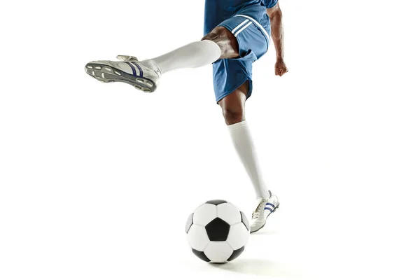 Benen i fotboll spelare närbild isolerad på vit — Stockfoto