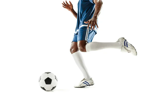 Pernas de jogador de futebol close-up isolado em branco — Fotografia de Stock