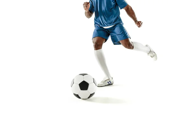 Benen van voetbal speler close-up geïsoleerd op wit — Stockfoto