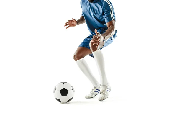 Pernas de jogador de futebol close-up isolado em branco — Fotografia de Stock