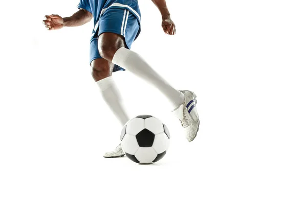 Pernas de jogador de futebol close-up isolado em branco — Fotografia de Stock