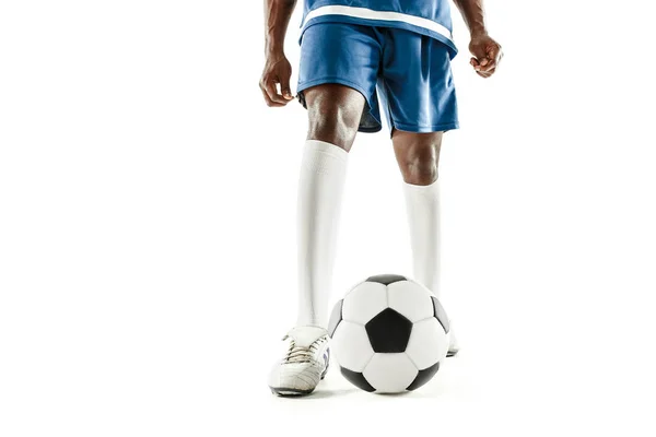 Beine eines Fußballers in Großaufnahme isoliert auf weiß — Stockfoto
