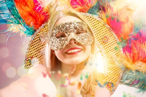 Beautiful young woman in carnival mask — Stock Photo, Image