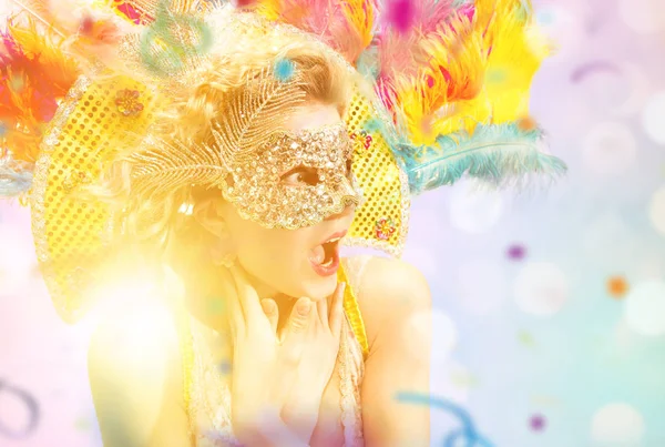 Beautiful young woman in carnival mask — Stock Photo, Image