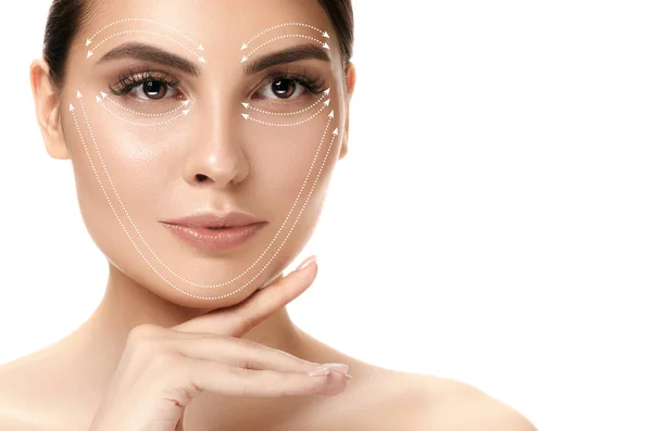 Close-up portrait of young, beautiful and healthy woman with arrows on her face — Stock Photo, Image