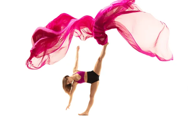 Ballerina. Young graceful female ballet dancer dancing over white studio. Beauty of classic ballet. — Stockfoto