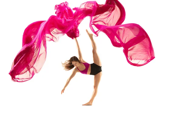 Ballerina. Young graceful female ballet dancer dancing over white studio. Beauty of classic ballet. — Stok fotoğraf