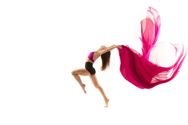 Ballerina. Young graceful female ballet dancer dancing over white studio. Beauty of classic ballet. — Stockfoto