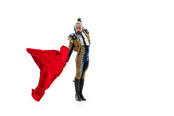 Torero in blue and gold suit or typical spanish bullfighter isolated over white — Stock Photo, Image