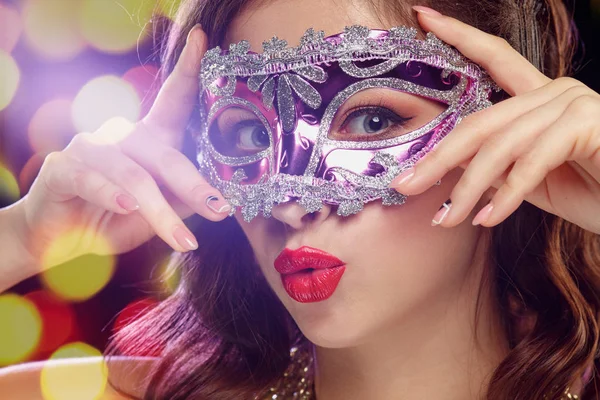 Beauty model woman wearing venetian masquerade carnival mask at party — Stock Photo, Image